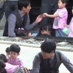 Kim Rae Won with School Children During Photo Shooting